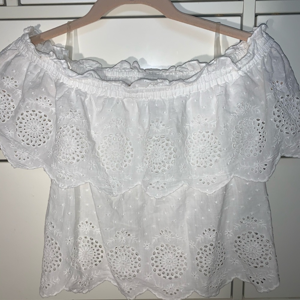white flower off the shoulder